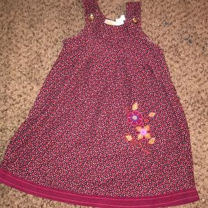 Red Dress flowers with gold buttons